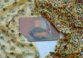Stoffe und Untersetzer mit Oliven